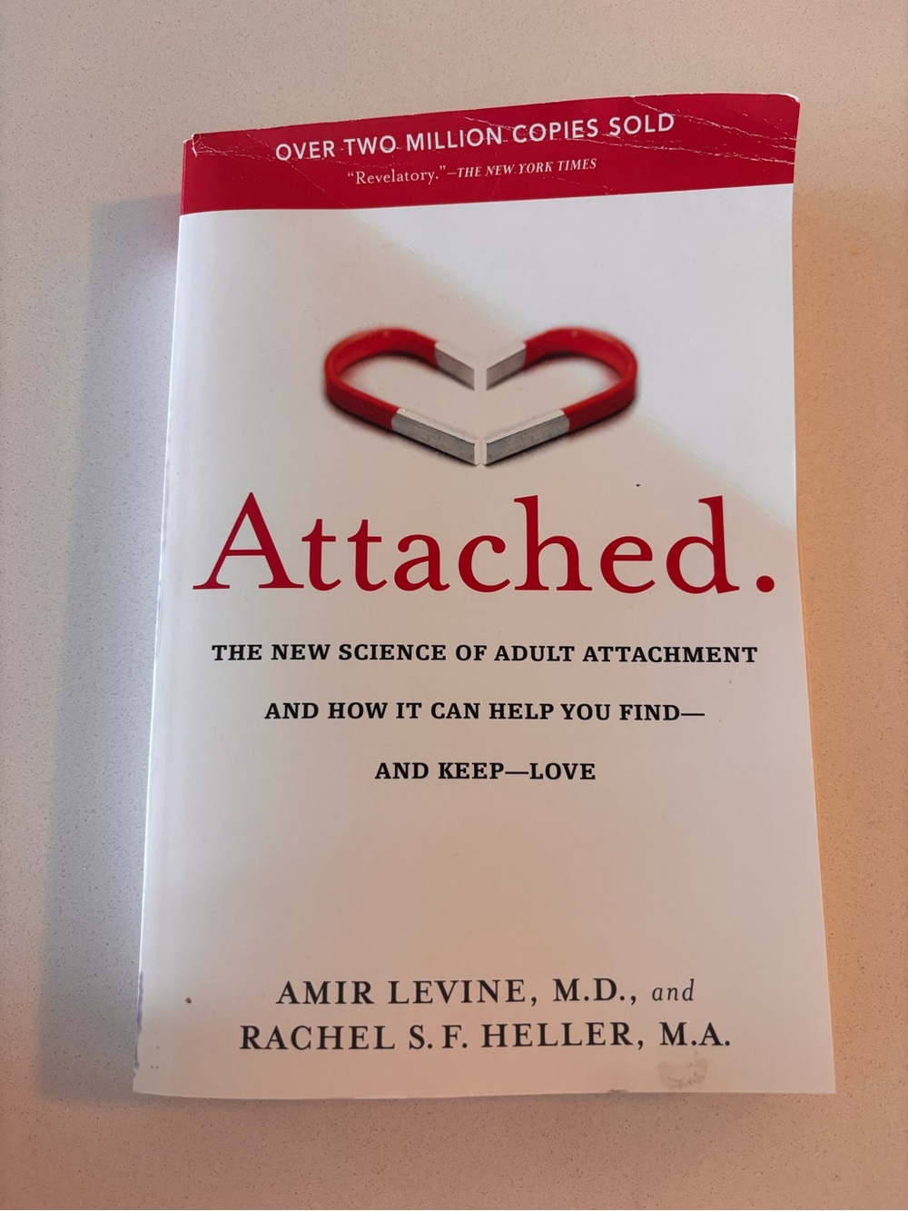 Indigo Attached. Paperback — White and Red Cover